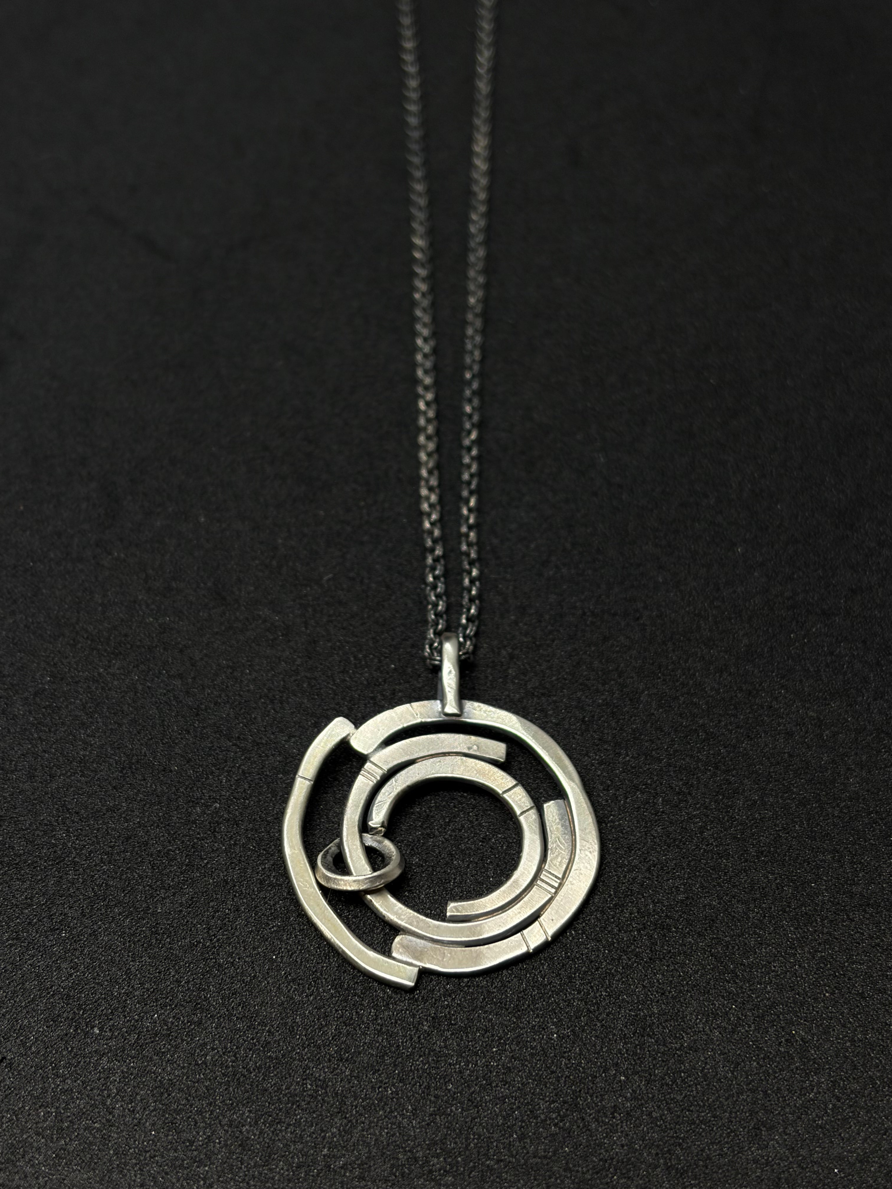 Orbital Moving Ring Silver Necklace