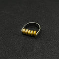 The Rolling Brass Bead Ring