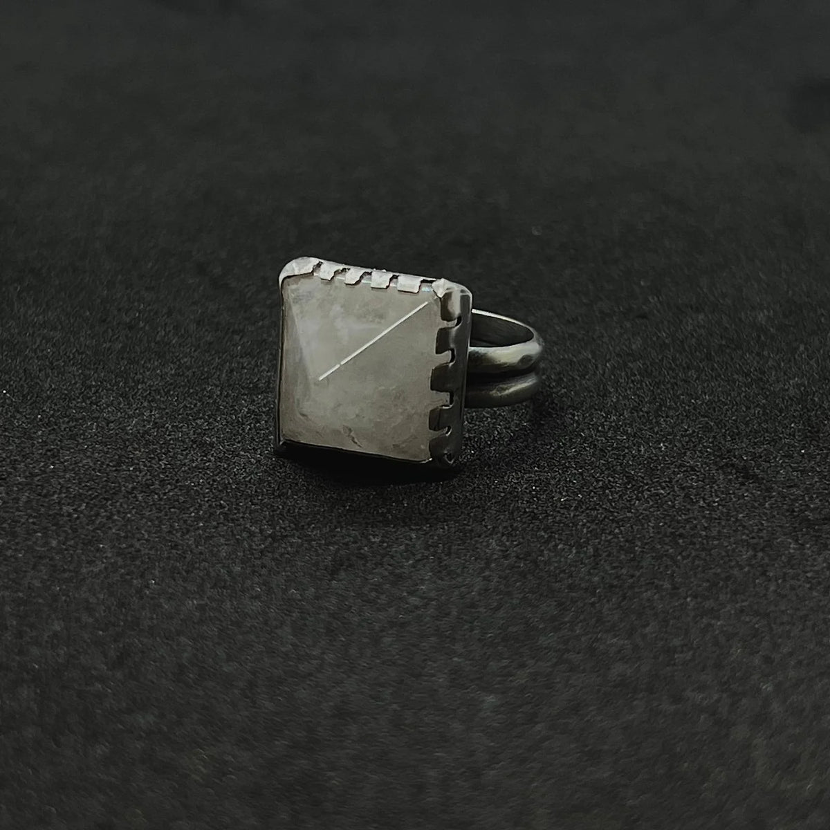 The white Pyramid Ring