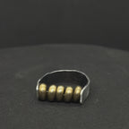 The Rolling Brass Bead Ring
